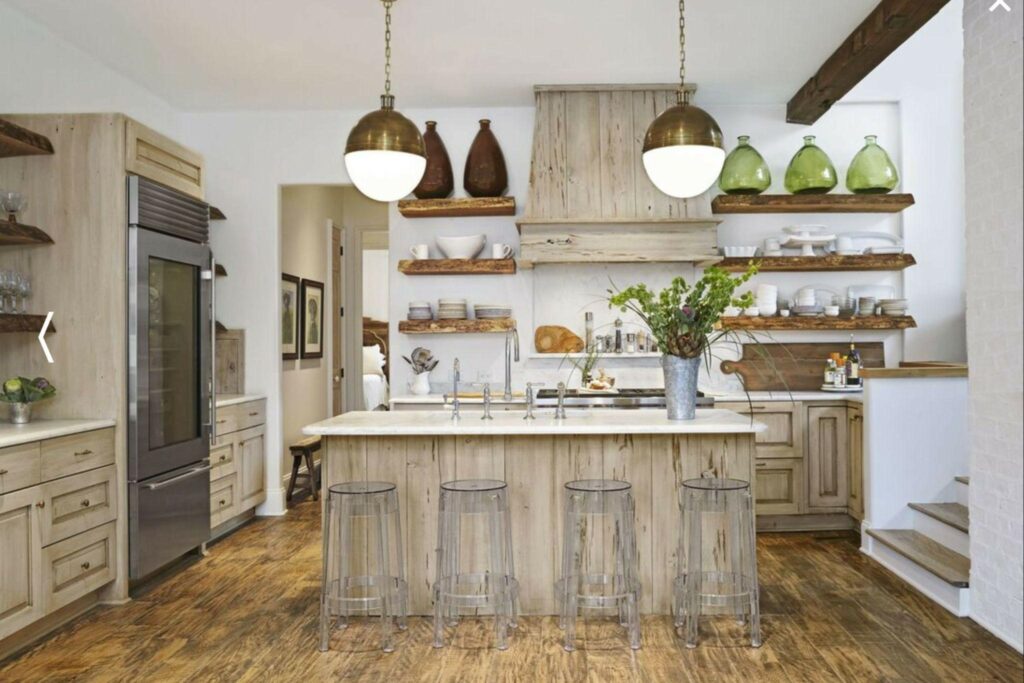kitchen with white quartz countertops and faded wooden cabinetry